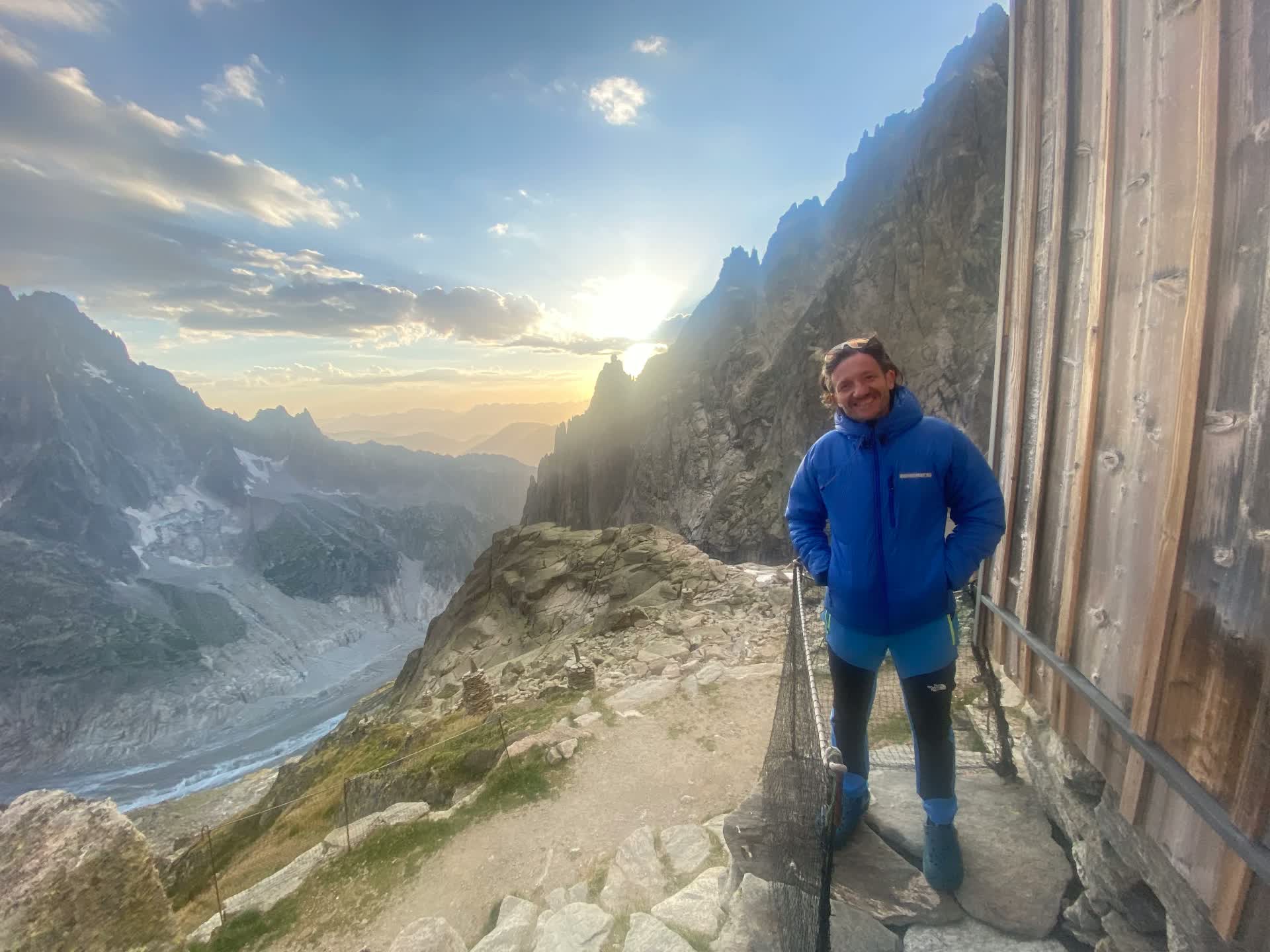 Outside an alpine hut above a glacier valley
